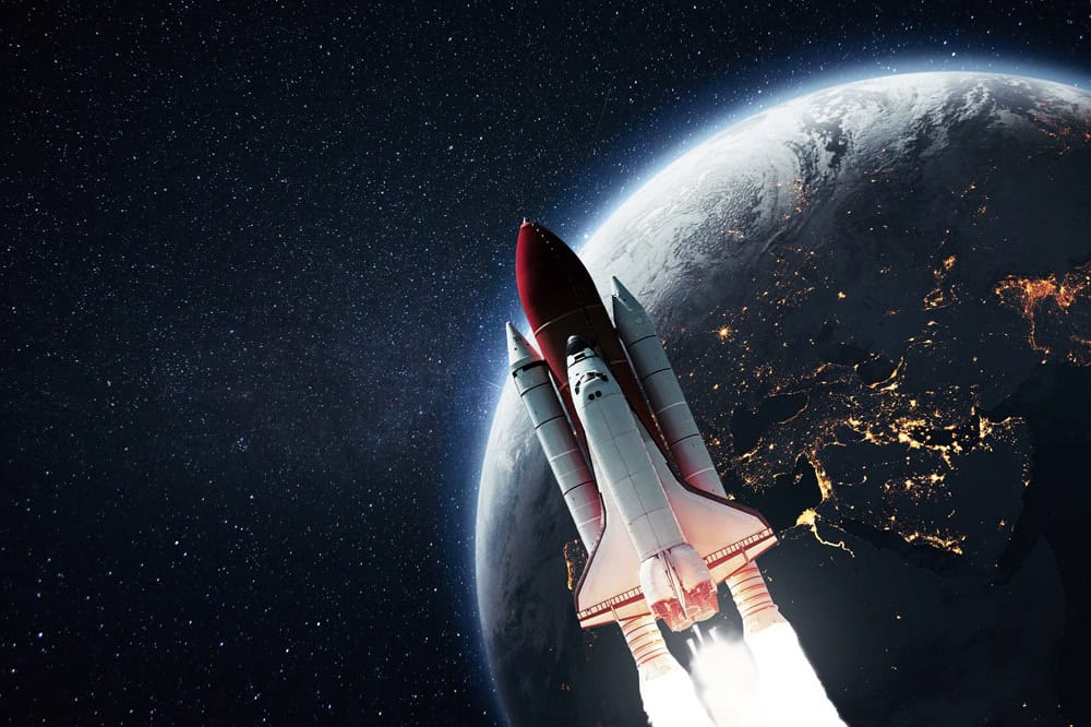 Rocket shuttle takes off from the planet earth into starry space. Successful spacecraft launch